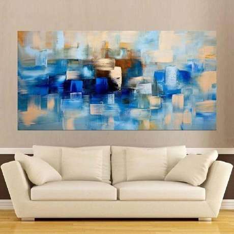 60. Sala decorada com quadro abstrato azul – Foto: Pinterest 60. Sala decorada com quadro abstrato azul – Foto: Pinterest