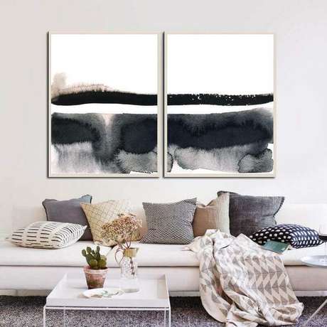 65. Decoração de sala com várias almofadas e quadro abstrato moderno preto e branco – Foto: Murilo Carvalho 65. Decoração de sala com várias almofadas e quadro abstrato moderno preto e branco – Foto: Murilo Carvalho
