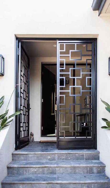 38. Modelo diferente e moderno de porta francesa de alumínio – Foto: Pinterest 38. Modelo diferente e moderno de porta francesa de alumínio – Foto: Pinterest