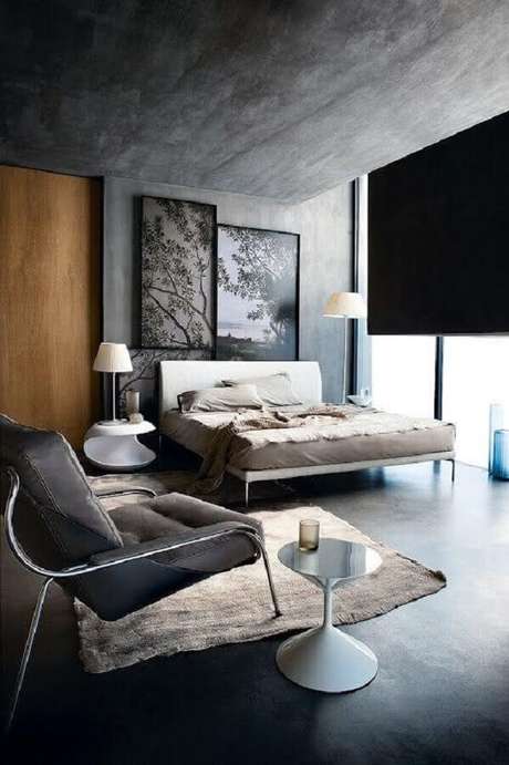 45. Poltrona cinza chumbo para quarto de casal moderno com cimento queimado na parede e teto – Foto: Pinterest 45. Poltrona cinza chumbo para quarto de casal moderno com cimento queimado na parede e teto – Foto: Pinterest
