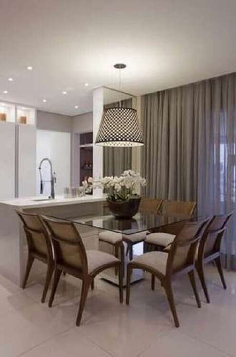 41. Sala de jantar moderna decorada com modelo rústico de vaos para mesa de jantar – Foto: Archello 41. Sala de jantar moderna decorada com modelo rústico de vaos para mesa de jantar – Foto: Archello
