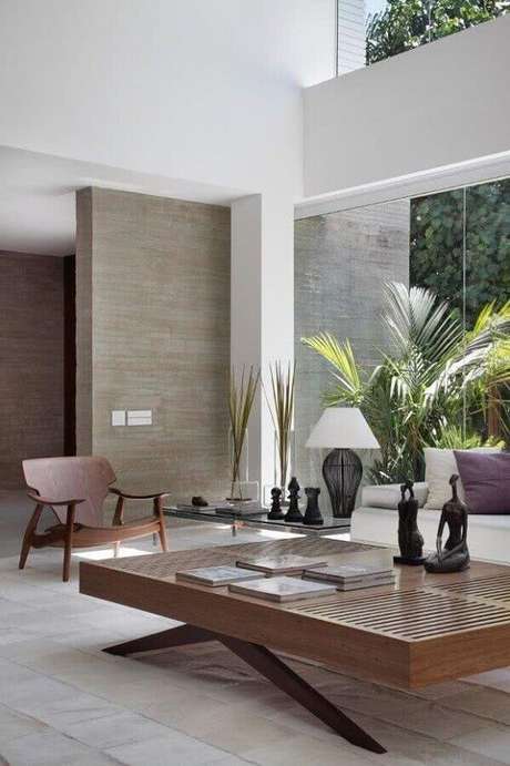 4. Sala de estar moderna decorada com mesa de centro de madeira maciça – Foto: Archi-Moze