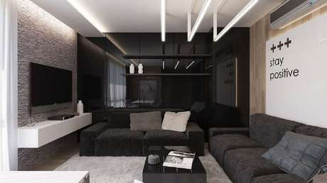 2. Decoração de sala preta moderna com tapete cinza – Foto: Pinterest