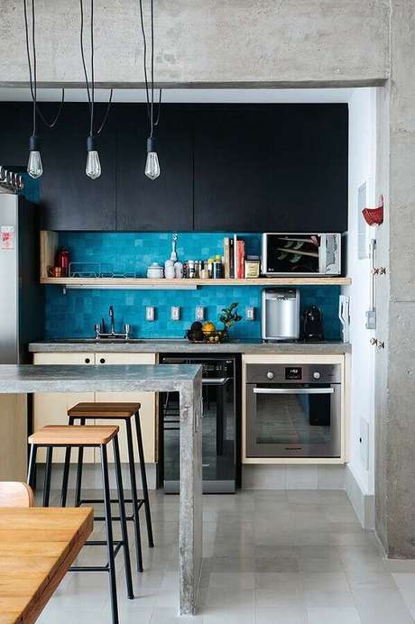 7. O cimento queimado garante uma bancada para cozinha pequena mais moderna – Foto: Futurist Architecture 7. O cimento queimado garante uma bancada para cozinha pequena mais moderna – Foto: Futurist Architecture