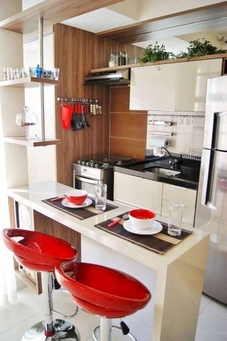 25. Banquetas vermelhas de bancada para cozinha americana pequena – Foto: Pinterest 25. Banquetas vermelhas de bancada para cozinha americana pequena – Foto: Pinterest