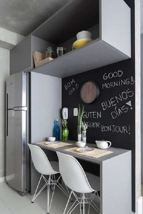 57. Mesa bancada para cozinha pequena cinza com parede preta – Foto: Pinterest 57. Mesa bancada para cozinha pequena cinza com parede preta – Foto: Pinterest