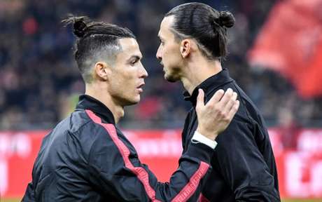 CR7 e Ibrahimovic serão destaques na tela da Band (Foto: ALBERTO PIZZOLI / AFP) CR7 e Ibrahimovic serão destaques na tela da Band (Foto: ALBERTO PIZZOLI / AFP)