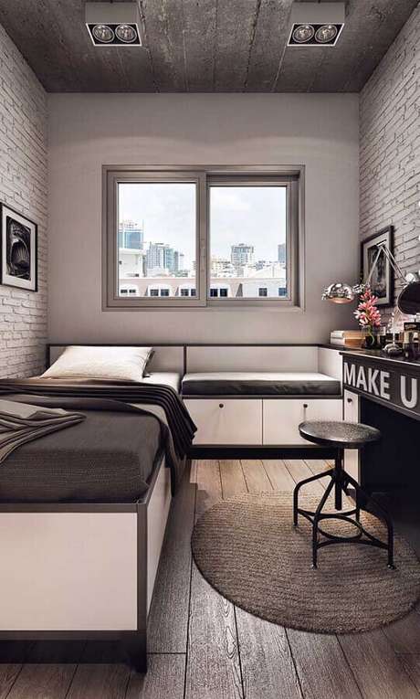 47. Móveis planejados para decoração de quarto pequeno solteiro cinza simples – Foto: Pinterest 47. Móveis planejados para decoração de quarto pequeno solteiro cinza simples – Foto: Pinterest