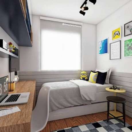 48. Bancada de madeira e cabeceira planejada cinza para decoração de quarto de solteiro pequeno – Foto: Dicas de Mulher 48. Bancada de madeira e cabeceira planejada cinza para decoração de quarto de solteiro pequeno – Foto: Dicas de Mulher