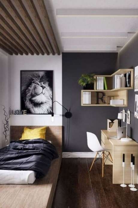 49. A cama baixa também é uma boa dica de como decorar um quarto pequeno de solteiro e criar a sensação de que o ambiente é maior – Foto: Futurist Architecture 49. A cama baixa também é uma boa dica de como decorar um quarto pequeno de solteiro e criar a sensação de que o ambiente é maior – Foto: Futurist Architecture