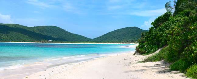 <strong>Flamenco Beach, Puerto Rico</strong><br />A pequena ilha de Culebra é um dos segredos mais bem preservados do Caribe. Situada ao largo de Puerto Rico, Culebra tem praias fantásticas como Flamenco Beach, com areias finas e águas de diferentes tons de azul