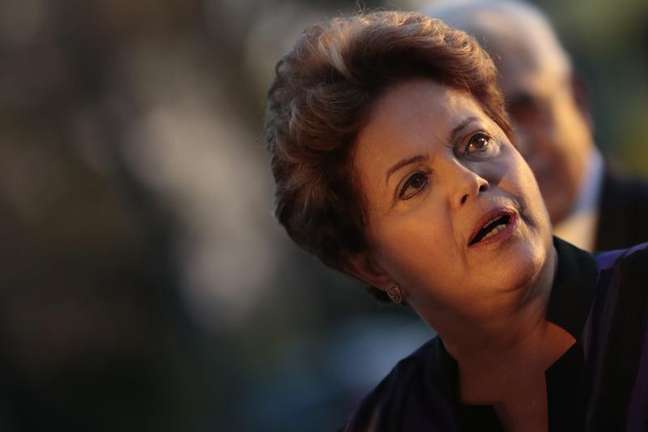 <p>A presidente da República reage durante evento no Palácio da Alvorada, em Brasília</p>