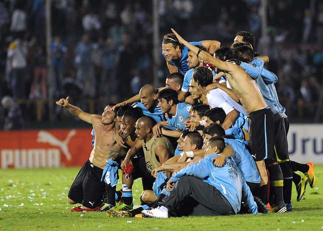 <p>Uruguai festejou vaga na Copa do Mundo de 2014 ap&oacute;s empate sem gols diante da Jord&acirc;nia</p>