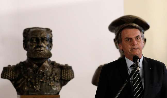 O presidente Jair Bolsonaro após se encontrar com o ministro da Defesa, Fernando Azevedo e Silva