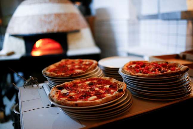 Pizza é sinônimo de felicidade para italianos