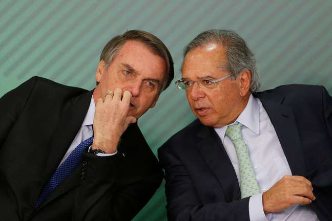 Bolsonaro e Guedes, em evento no Planalto  8/4/2019 REUTERS/Adriano Machado