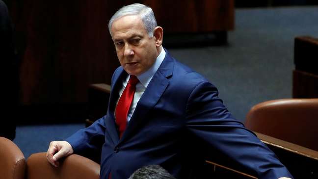 Benjamin Netanyahu durante votação no Parlamento israelense