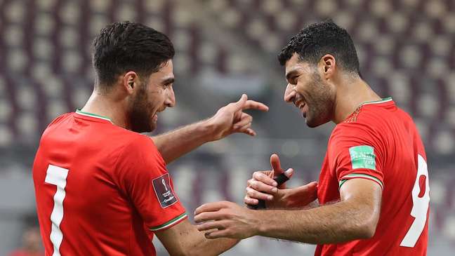 Jogadores comemoram vitória do Irã sobre o Iraque Divulgação Site Confederação Asiática de Futebol