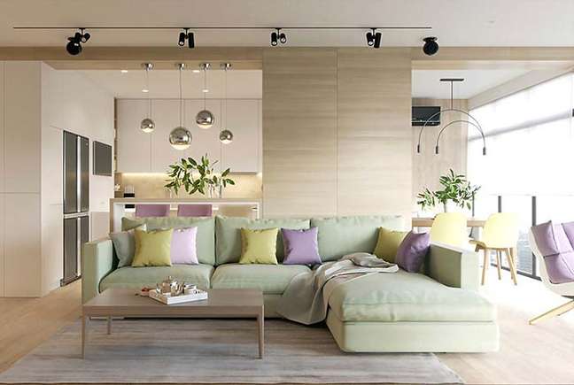 40. Sofá verde pastel com almofadas coloridas – Foto Decor Facil