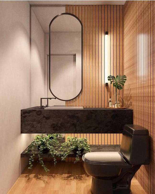 33. Parede com madeira ripada para decoração de lavabo planejado moderno – Foto: Behance