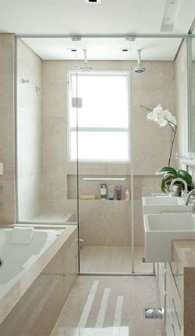24. Decoração clean para banheiro planejado com nicho no box – Foto: Otimizi