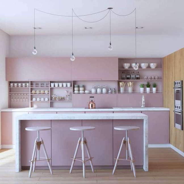 12. Linda cozinha moderna decorada em cores tons pasteis rosa com ilha de mármore – Foto: Ann Arquitetura