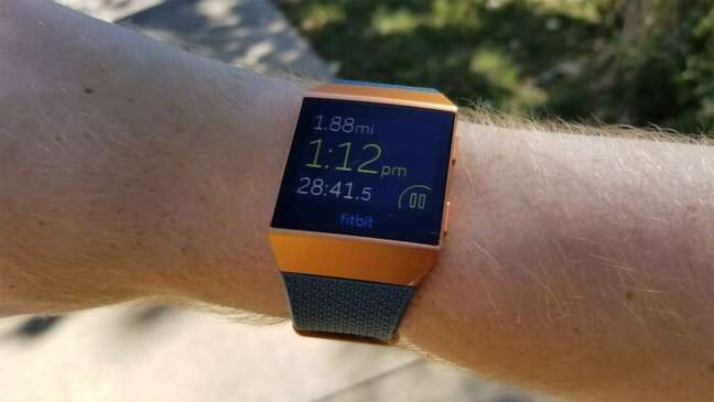 Fitbit Ionic in Burnt Orange color on a user's wrist 