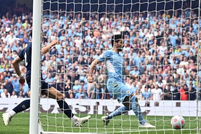 Manchester City é campeão da Premier League 2021/2022 (Foto: Oli SCARFF / AFP)
