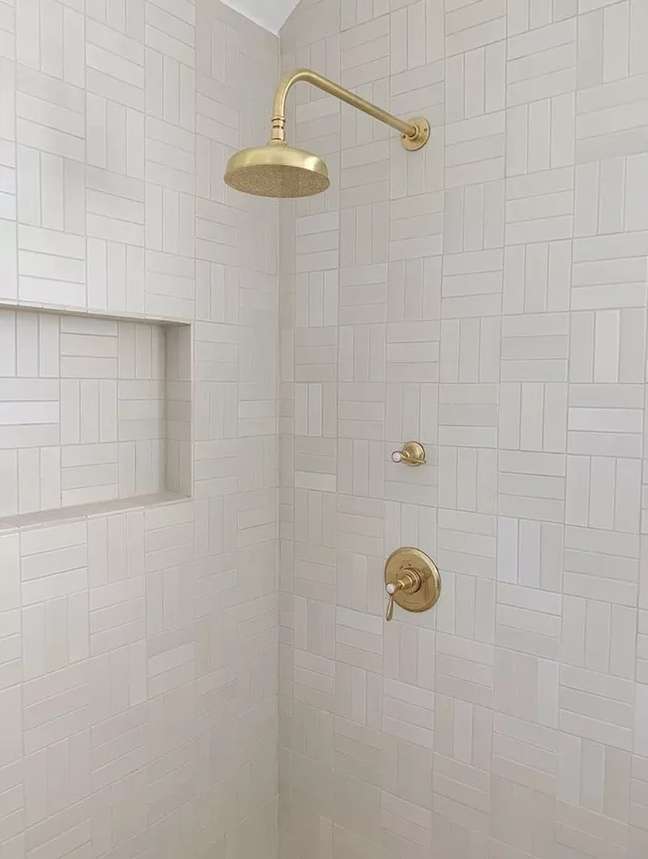 Subway tile is a classic choice for bathrooms, but just because it's popular doesn't mean you have to go the usual route.  Check out this beautiful bathroom from Cathie Hong Interiors that features a pearl-colored subway tile placed in a cross-hatch arrangement.  This is a great way to innovate things but keep your bathroom classic.