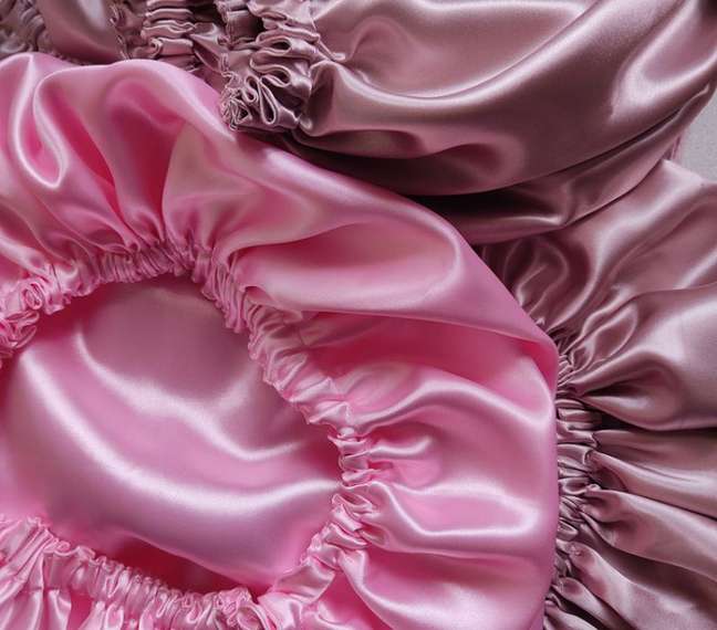 Satin pillowcases and caps help prevent chafing during the night Satin pillowcases and caps help prevent chafing during the night