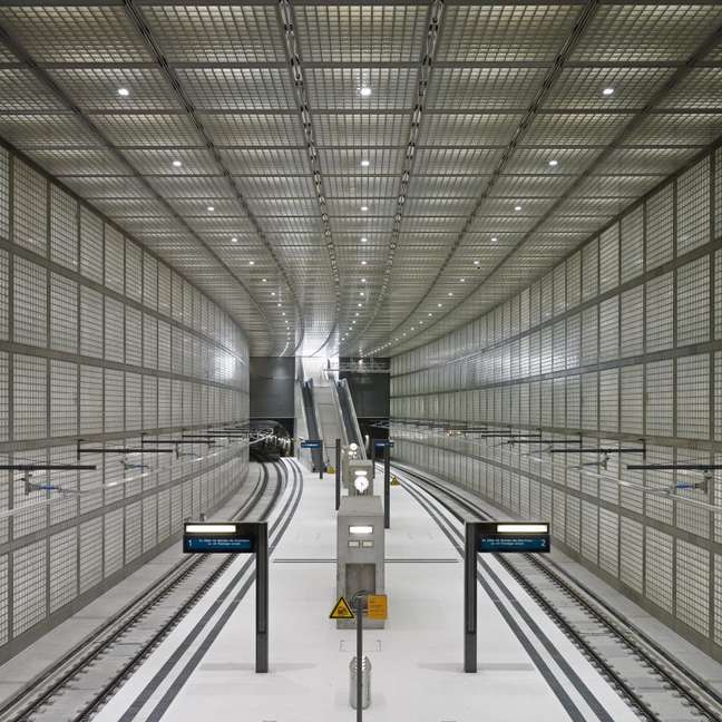 Subway station corridor with artificial lighting.