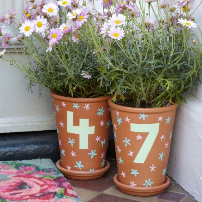 Paint your house number on potted plants.
