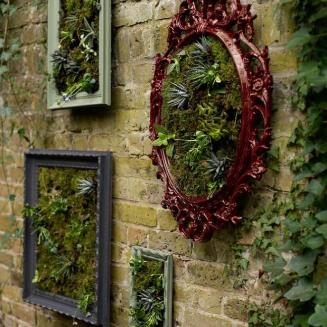 Add interest to the walls with framed plants.