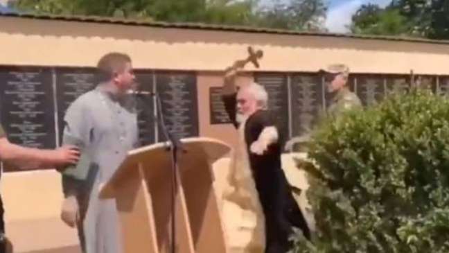 Russian priest hits Ukrainian with crucifix