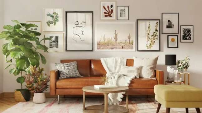 Caramel leather sofa with rear wall with frame arrangement. Caramel leather sofa with rear wall with frame arrangement.