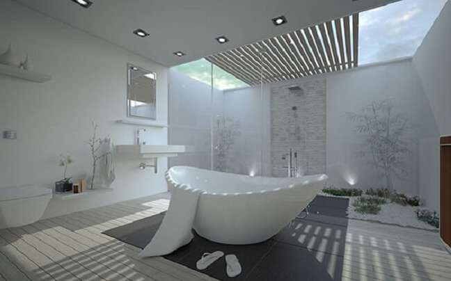 39. Projeto com claraboia banheiro e banheira sofisticada. Fonte: Decoratorist