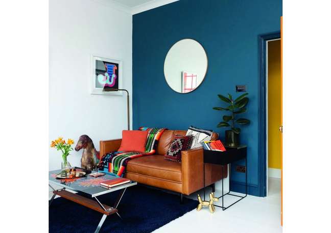 Add an accent wall in a warm color.