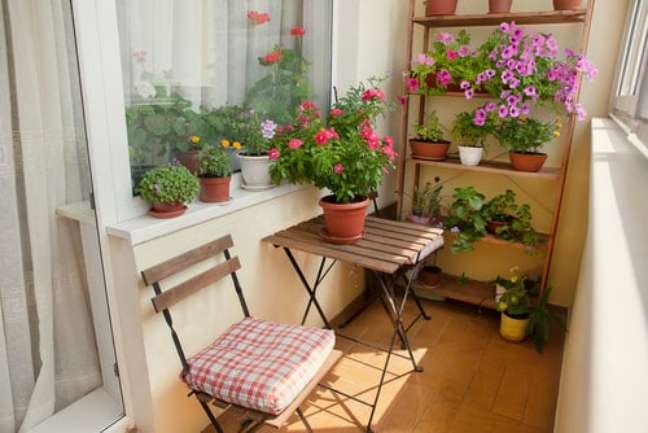 Balcony decorated with flower pots. Balcony decorated with flower pots.