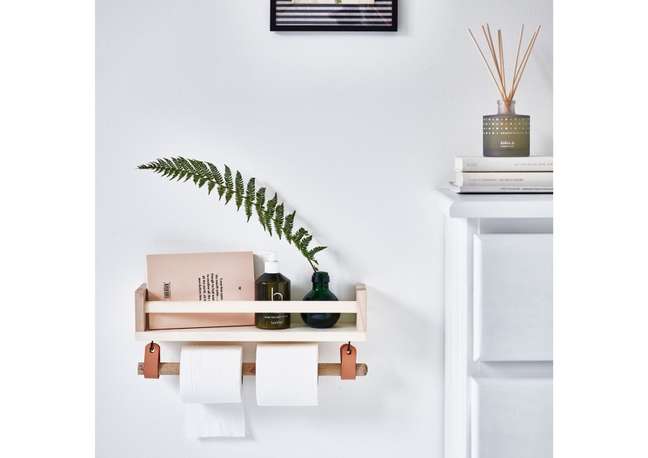 Turn a spice rack into a toilet paper holder. Turn a spice rack into a toilet paper holder.