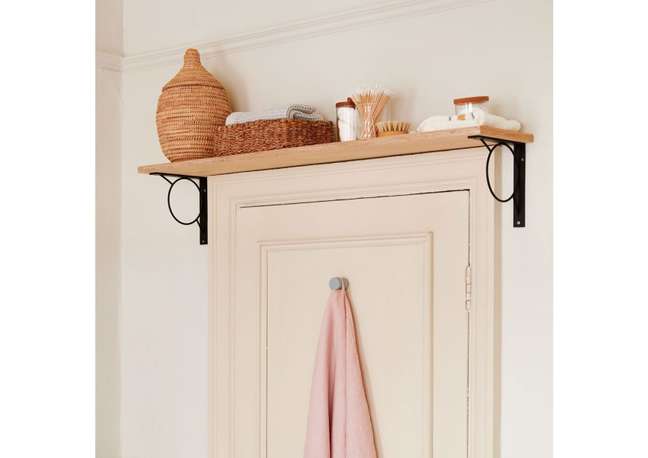 Place a shelf over the bathroom door. Place a shelf over the bathroom door.