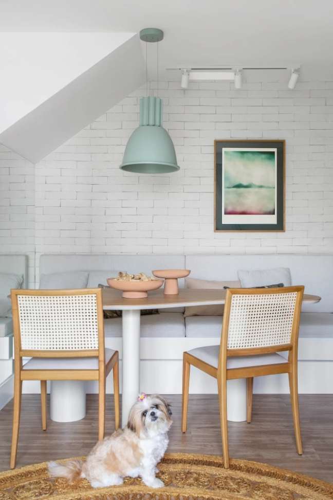 Dining table with masonry bench in Dining table with masonry bench in
