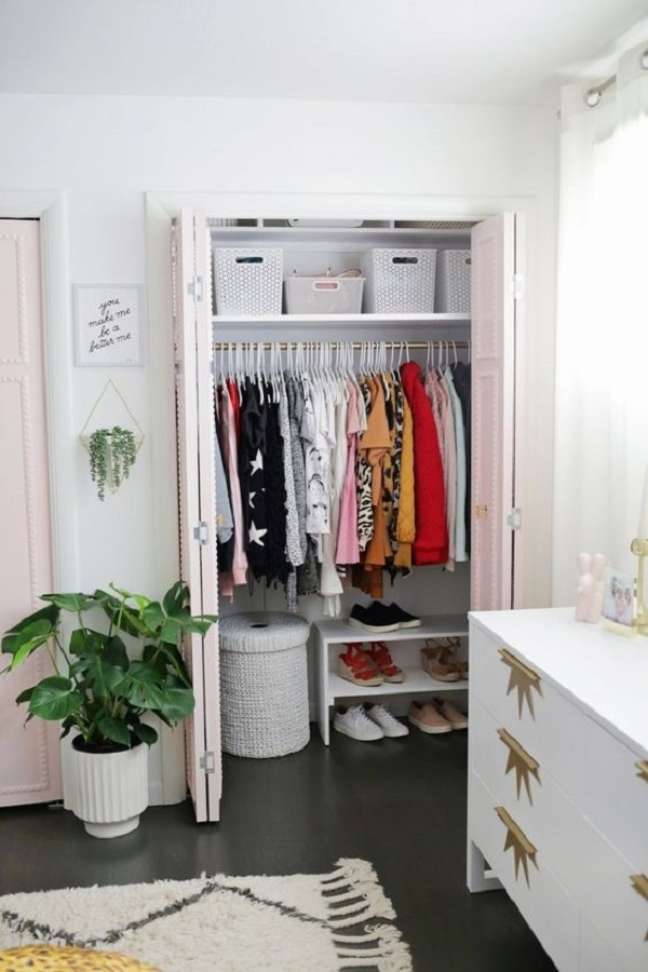 17. Small wardrobe in the bedroom with wooden shoe cabinet - Photo A Beutiful Mess 17. Small wardrobe in the bedroom with wooden shoe cabinet - Photo A Beutiful Mess