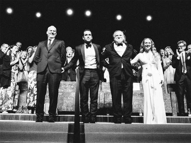 The director’s film ‘3 Ads for a Murder’ receives 14 minutes of applause in Venice
