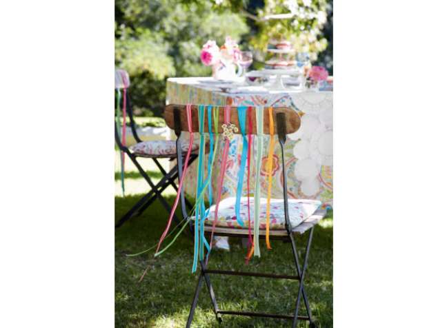 Decorate the chairs for a party atmosphere Decorate the chairs for a party atmosphere
