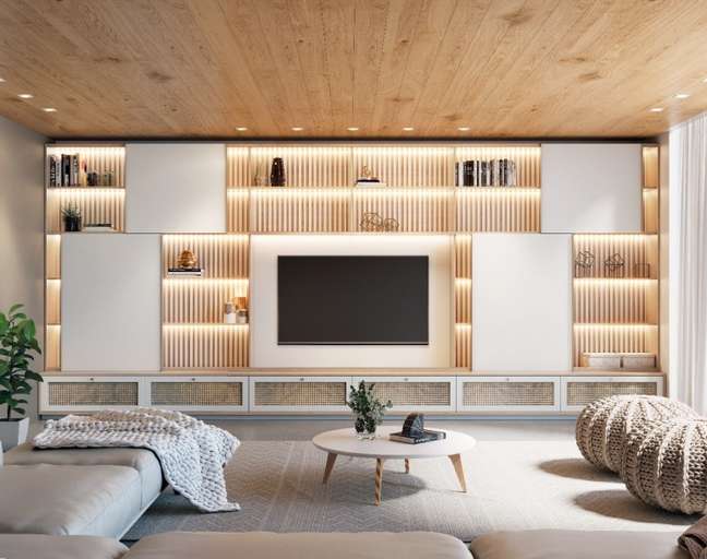 The slatted bookcase and the sliding panels allow a good use of the environment, in addition to the drawers that help organize the space The slatted bookcase and the sliding panels allow a good use of the environment, in addition to the drawers that help organize the space