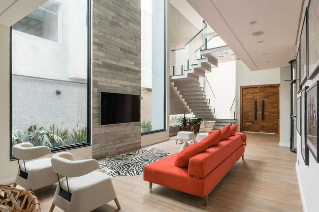 See how to apply the trend of the walls with cement coatings in the decoration