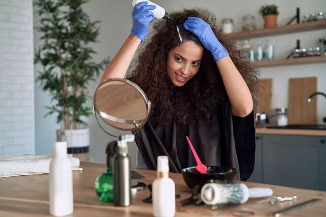 Unlike toner, the dye removes the natural color of the threads. 