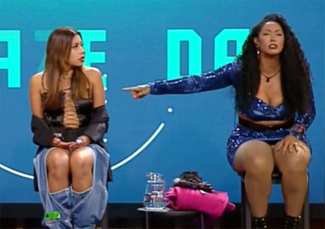 Farm Fight 14: Rosi throws water in Ingrid’s face during an interview