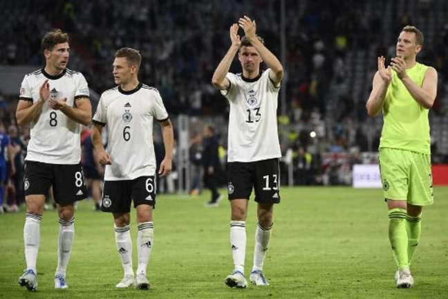 Müller (Mitte) sollte die letzte WM seiner Karriere spielen (Tobias Schwarz/AFP)