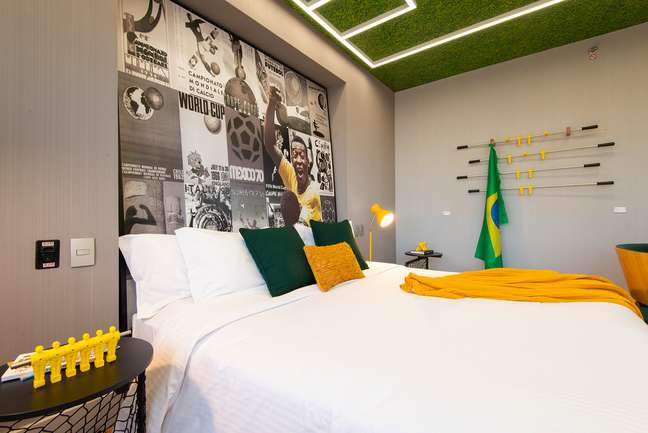 World Cup: themed room with grass on the ceiling and ticket holder
